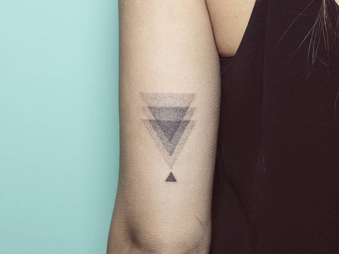 Значение трех треугольников в тату