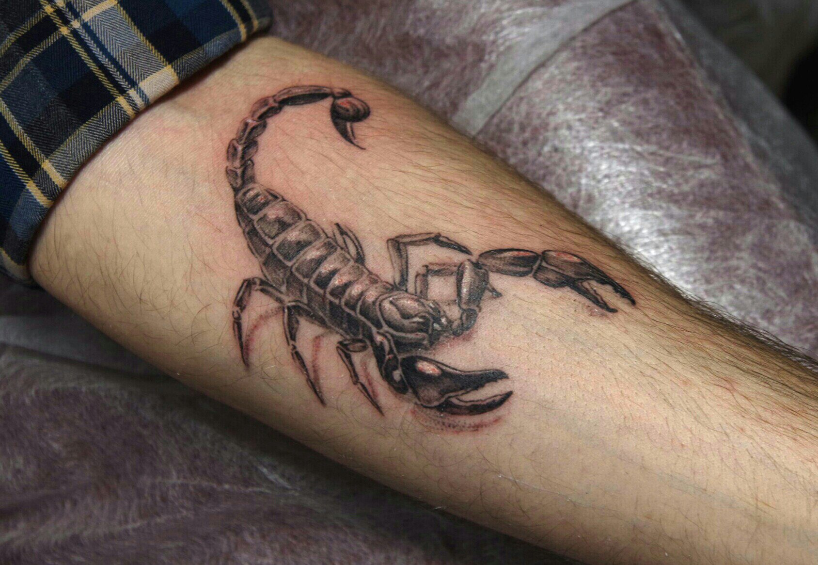 Татуировка в виде скорпиона – сила и власть