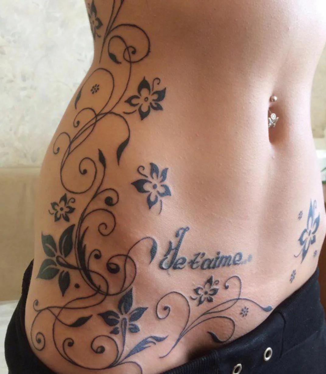 Татуировки для женщины 50 лет на животе